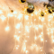 ^ 144 LED ICICLE LIGHT 5-7-5-7, 24 STRINGS, WARM WHITE, ADAPTOR 31VDC & CONNECTABLE MAX 4 SETS, IP44 300x60cm TRANSPARENT CABLE X08144121