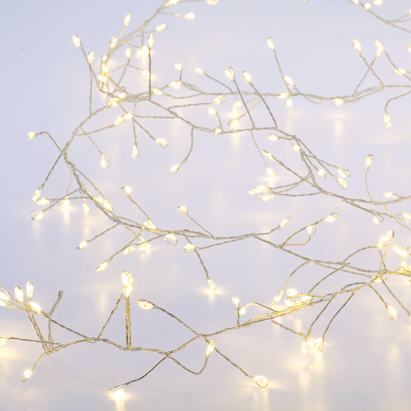 ^ 300 CLUSTER LED STRING LIGHTS, WW, SILVER COPPER WIRE, ADAPTOR (4.5VDC) & 8 FUNCTIONS,IP44, 3M+3M, 6W X063001177