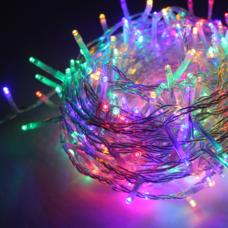 ^ 300 LED STRING LIGHTS (PER 5cm), MULTICOLOR, ADAPTOR (31VDC) & 8 FUNCTIONS,IP44, 15m, TRAN/NT CABLE X08300322