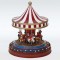 LIGHTED CAROUSSEL, WITH MUSIC AND MOVEMENT, WITH TRANSFORMER, 22,5x22,5x26,5cm 600-43429
