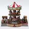 LIGHTED CAROUSSEL, 2 LAYERS, WITH LITTLE STORES, WITH MUSIC AND MOVEMENT, WITH TRANSFORMER, 39x28x34cm 600-43432